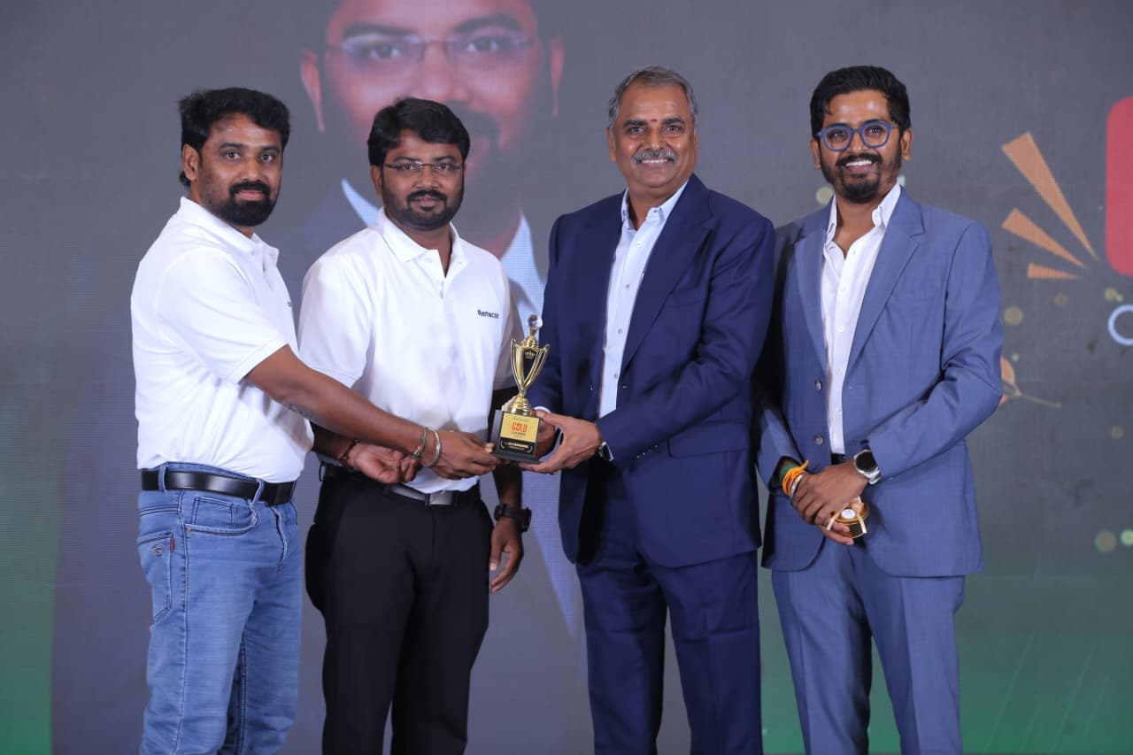 AACPanels.in team members receiving an award on stage